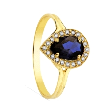 Anillo fabricado en oro de 18 kilates.
Piedra azul con filo de circonitas, tamaño 10 x 8 mm.