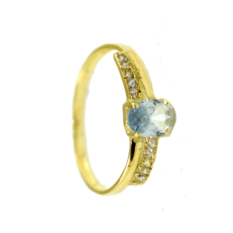 Sortija de mujer fabricada en oro de 18 kilates.<BR>Anillo de mujer con piedra semipreciosa color aguamarina, talla forma oval c