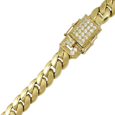 <P>Pulsera cubana para hombre, fabricada en oro de 18 kilates.<BR>Con circonitas de adorno en el cierre.<BR>Largo&nbsp;20 cm. An