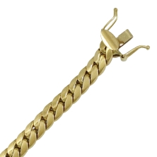 <P>Pulsera cubana para hombre, fabricada en oro de 18 kilates.<BR>Largo 19 cm. Ancho 6 mm. con cierre de lengueta y ochos de seg