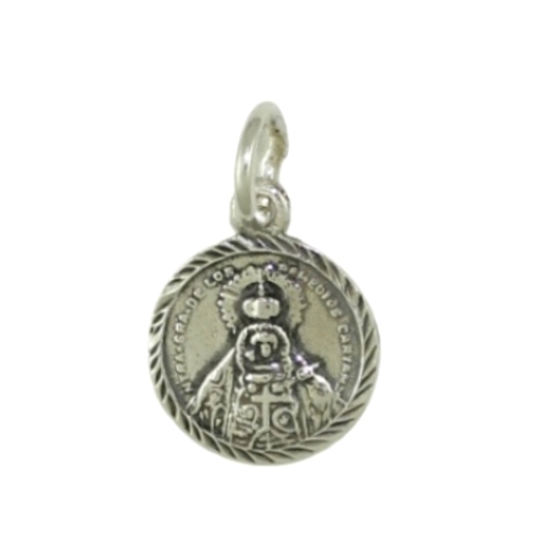 Medalla de la Virgen de los Remedios de Cartama de 16 mm. fabricada en plata de ley.<BR>Este producto se entrega estuchado y env