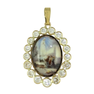 <STRONG>Medalla Virgen de Fátima 23 x 19 mm oro 18k esmalte. Medalla Virgen de Fátima</STRONG> con circonitas. Esta <STRONG>meda
