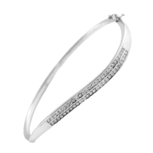 Pulsera de mujer<STRONG> Fabricada en oro blanco 9 kilates<BR></STRONG>Con forma de aro, en la parte central con doble onda de c