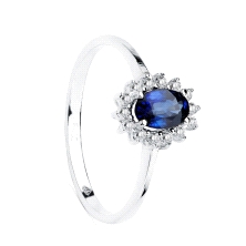 Sortija con diamantes en talla brillante de 0.30 cts  y zafiro de 0.98 qtes en oro blanco de 18 kilates. Este producto se entreg