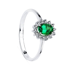 Sortija con diamantes en talla brillante de 0.29 cts  y esmeralda de 0.75 qtes en oro blanco de 18 kilates. Este producto se ent
