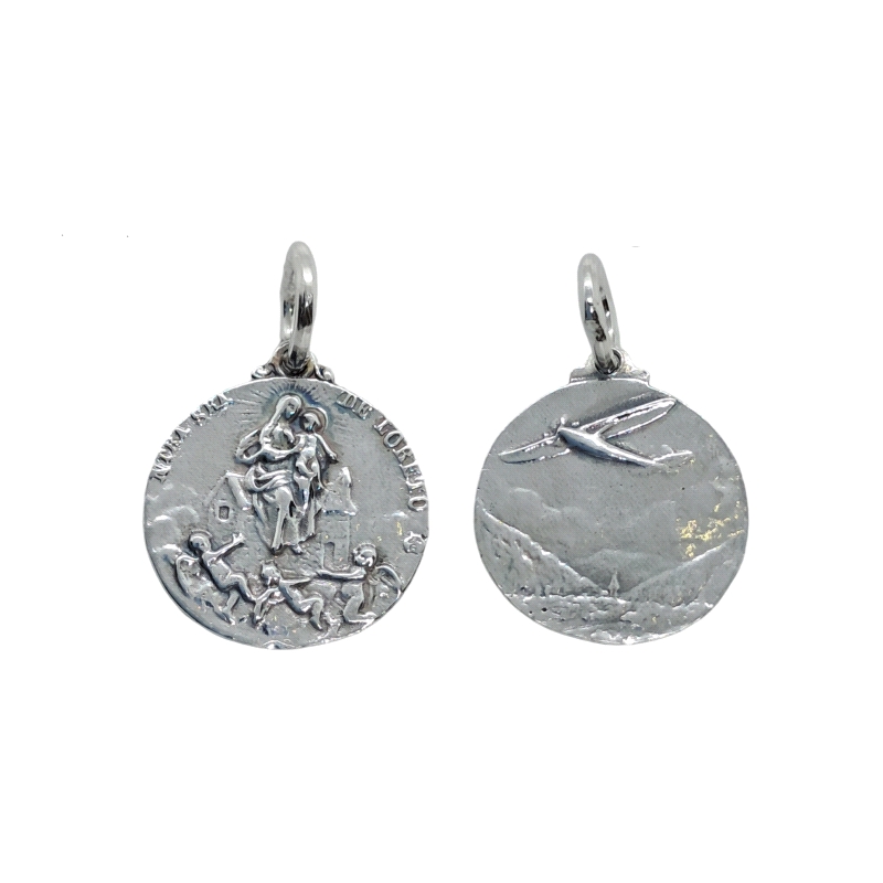 Medalla Virgen de Loreto en plata<BR>Medalla con el relieve de Ntra. Sra.de Loreto, patrona de la aviación. En la parte trasera 