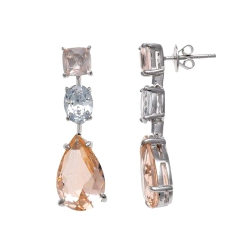 Pendiente fabricado en plata de ley.
Largos con piedras color caramelo y circonitas.
