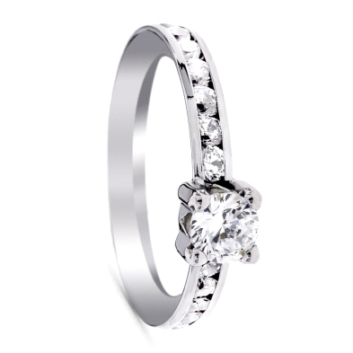 Anillo solitario oro blanco 9 kilates <BR>Solitario con circonita central de 5mm y laterales con circonitas<BR>Fabricado en oro 